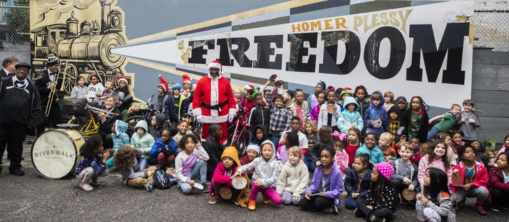 Photos: Homer A. Plessy Community School students second-line to NOPD's