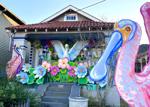 A house at 2656 LePage St. converted to a stationary ‘float’ by the Krewe of Red Beans “Hire a Mardi Gras Artist” program.jpeg