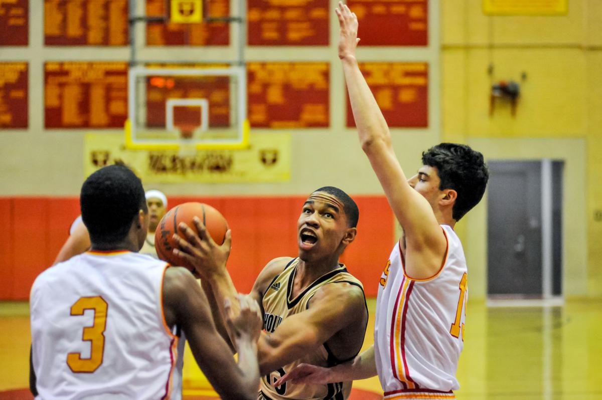 Holy Cross Prevails Over Brother Martin Behind Kalil Thomas 22