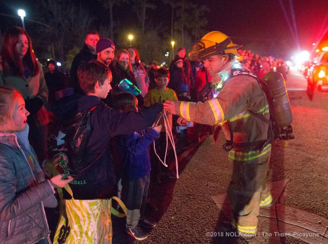 Krewe of Eve rolls in Mandeville See photos from the parade Archive
