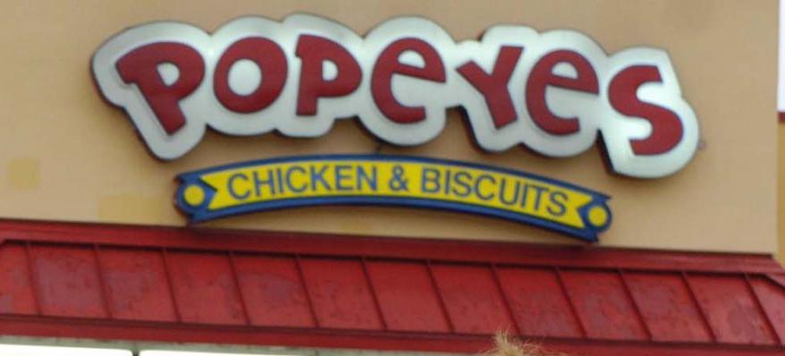 Popeyes chicken and biscuits sign