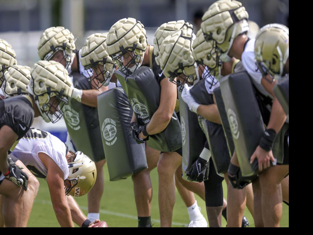 What in the world are those weird-looking helmets the Saints are