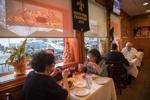 As vaccinations rise, older customers head back to New Orleans restaurants to celebrate