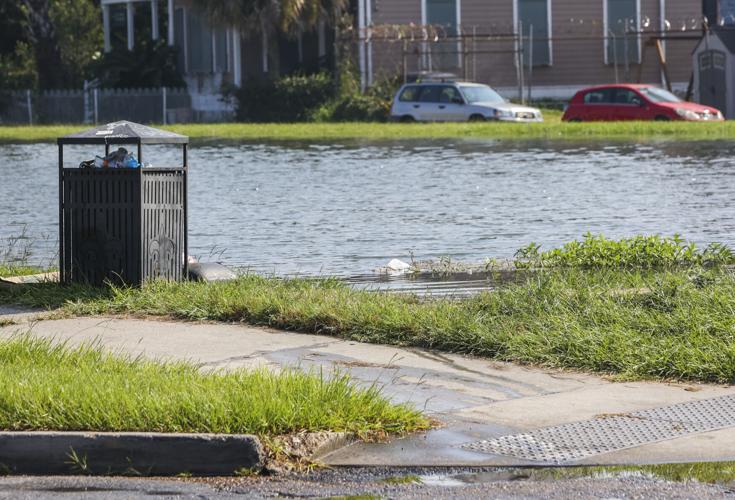 Bayou St. John tops its banks, seeps into yards after water valve