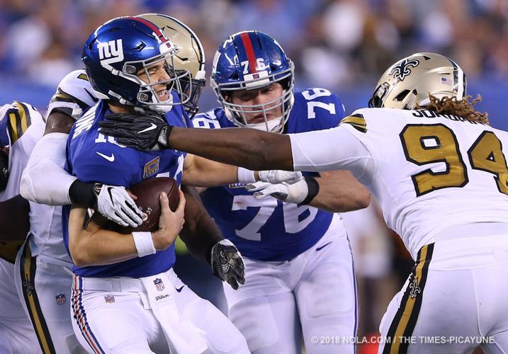 New Orleans Saints Demario Davis sacks New York Giants Eli Manning in the  3rd quarter in week 4 of the NFL season at MetLife Stadium in East  Rutherford, New Jersey on September