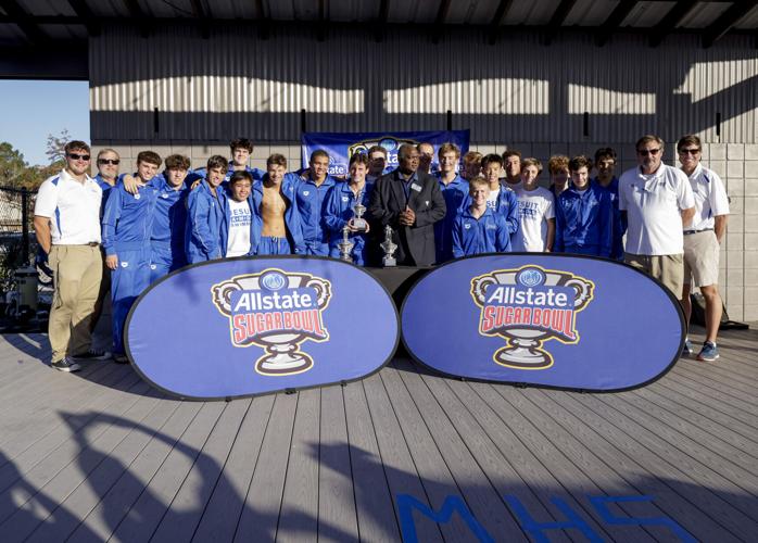 He learned to swim so his grandfather would let him go fishing. Now ...