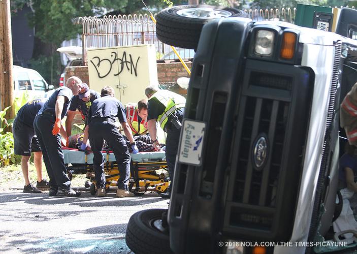 Medical transport van overturns in crash with SUV in Central City