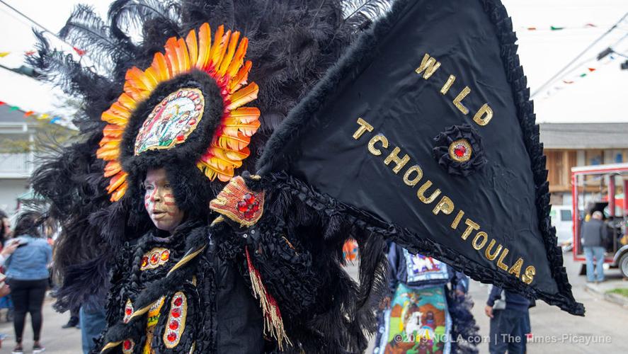 Mardi Gras Indians meander through Central City in New Orleans on Super Sunday 2019