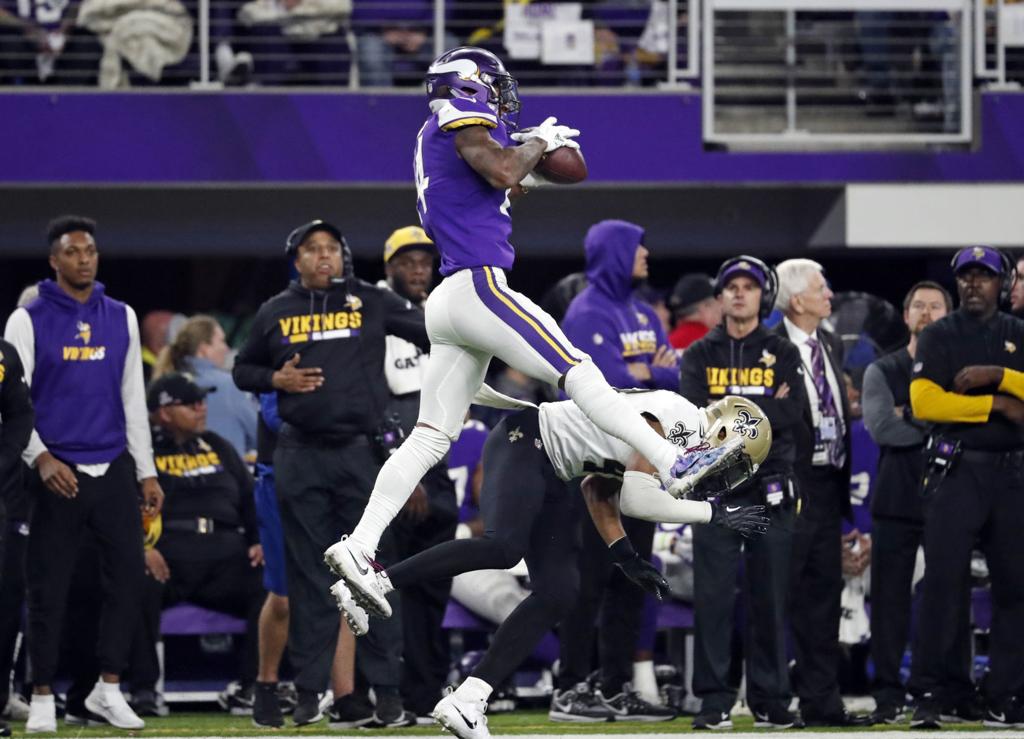 Minnesota Vikings' Stefon Diggs reaches for the ball during the  International Series NFL match at Twickenham, London Stock Photo - Alamy