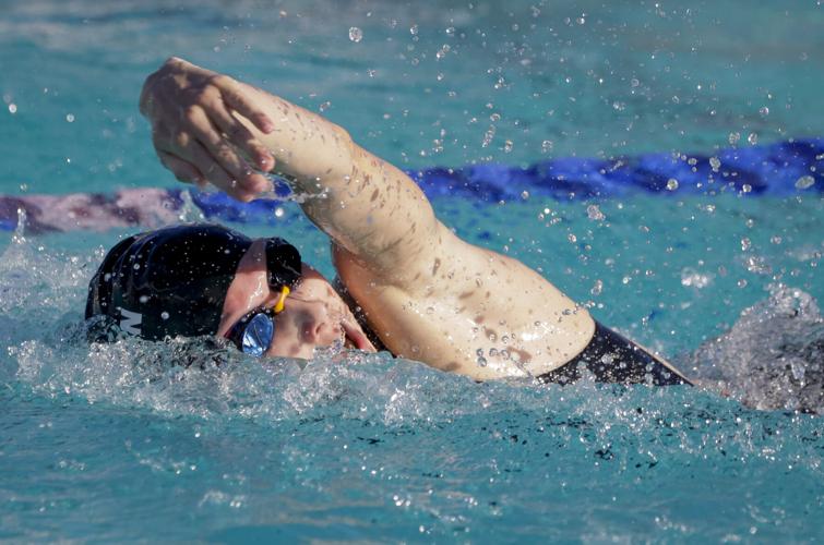 He learned to swim so his grandfather would let him go fishing. Now ...