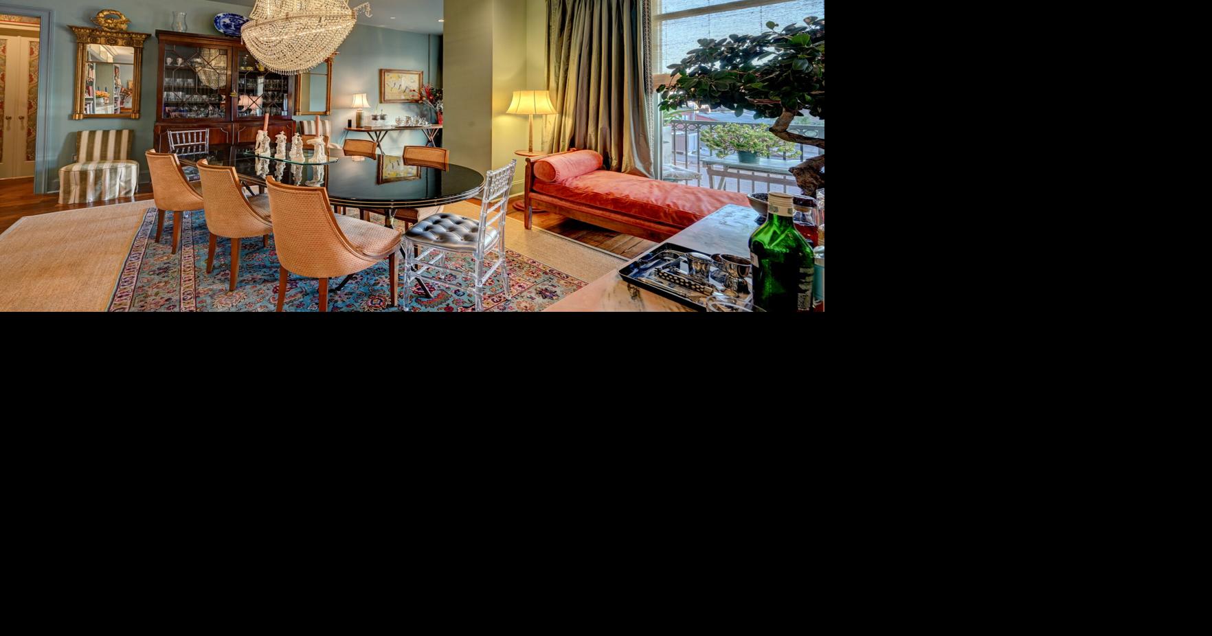 A life of world travels is reflected in a luxurious Warehouse District condo