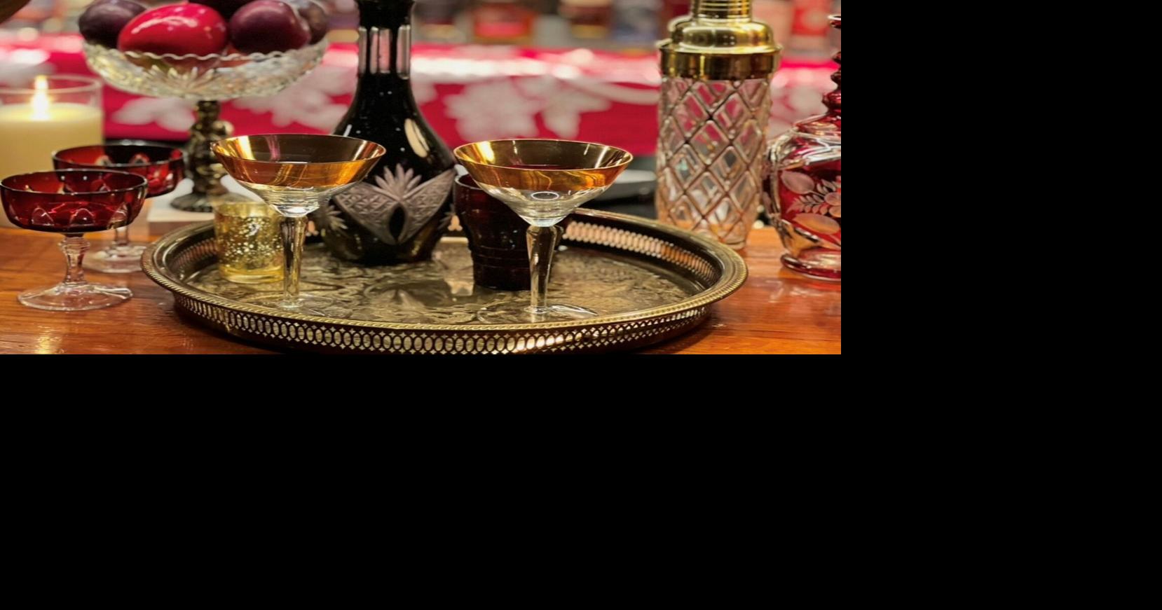 Vintage glassware, china add an elegant touch to the table. New Orleans stylist has what you need.