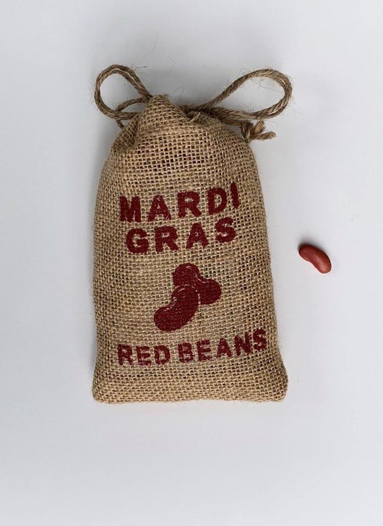 Weary of wasted Mardi Gras beads, New Orleans group makes local food