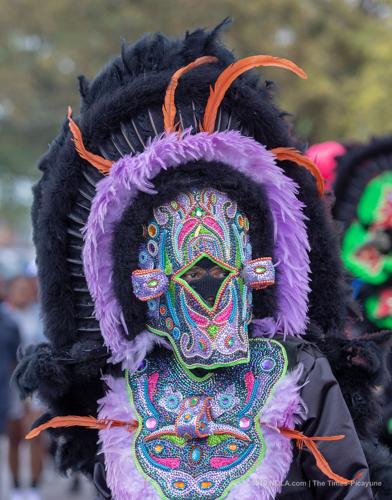 Mardi Gras Indians meander through Central City in New Orleans on Super Sunday 2019