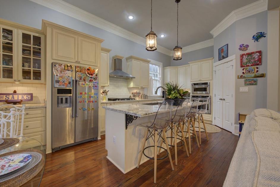 The camelback is new, but an Uptown couple holds on to the history embedded in their double | Home/Garden