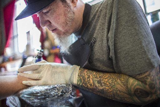 Tattoo tales Politicians show off  and explain  their ink  Ottawa  Citizen