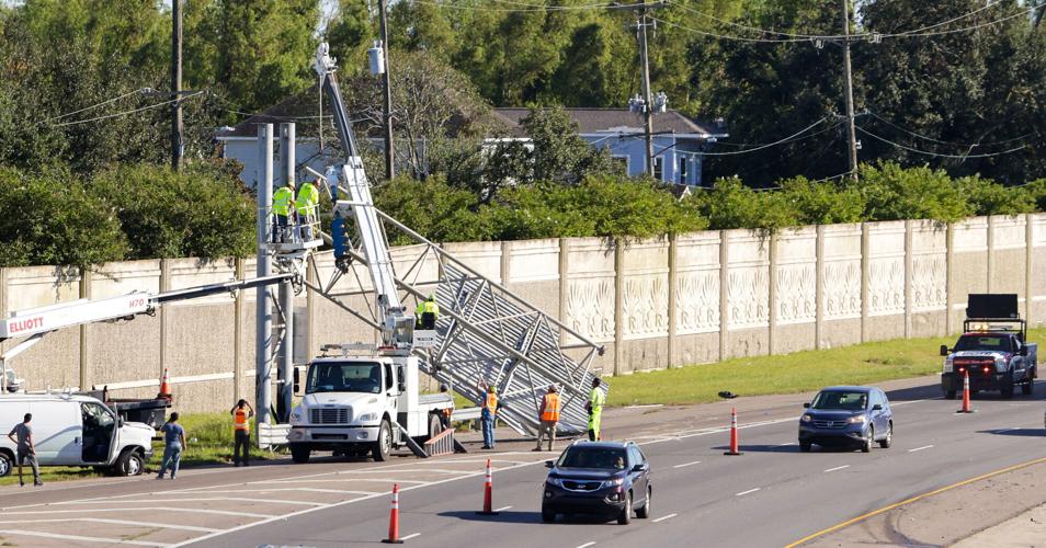Dump truck crash causes sign to block I10 West in New Orleans