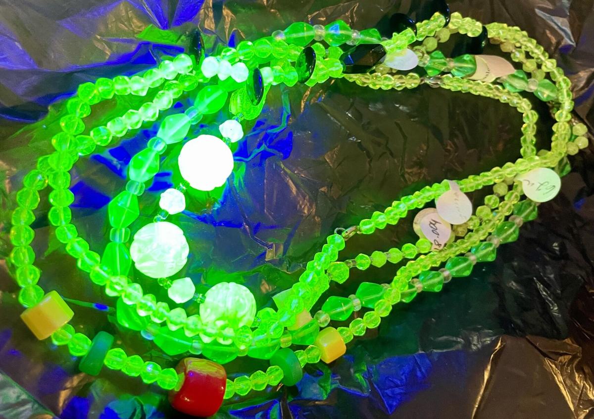 Mardi Gras beads made with Uranium glass