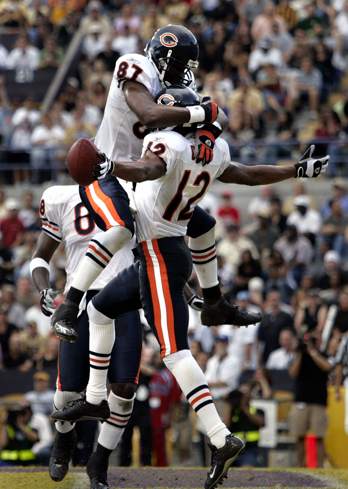 Chicago Bears wide receiver Muhsin Muhammad, (87) celebrates his