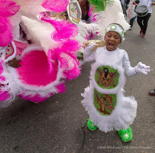 Mardi Gras Indians meander through Central City in New Orleans on Super Sunday 2019