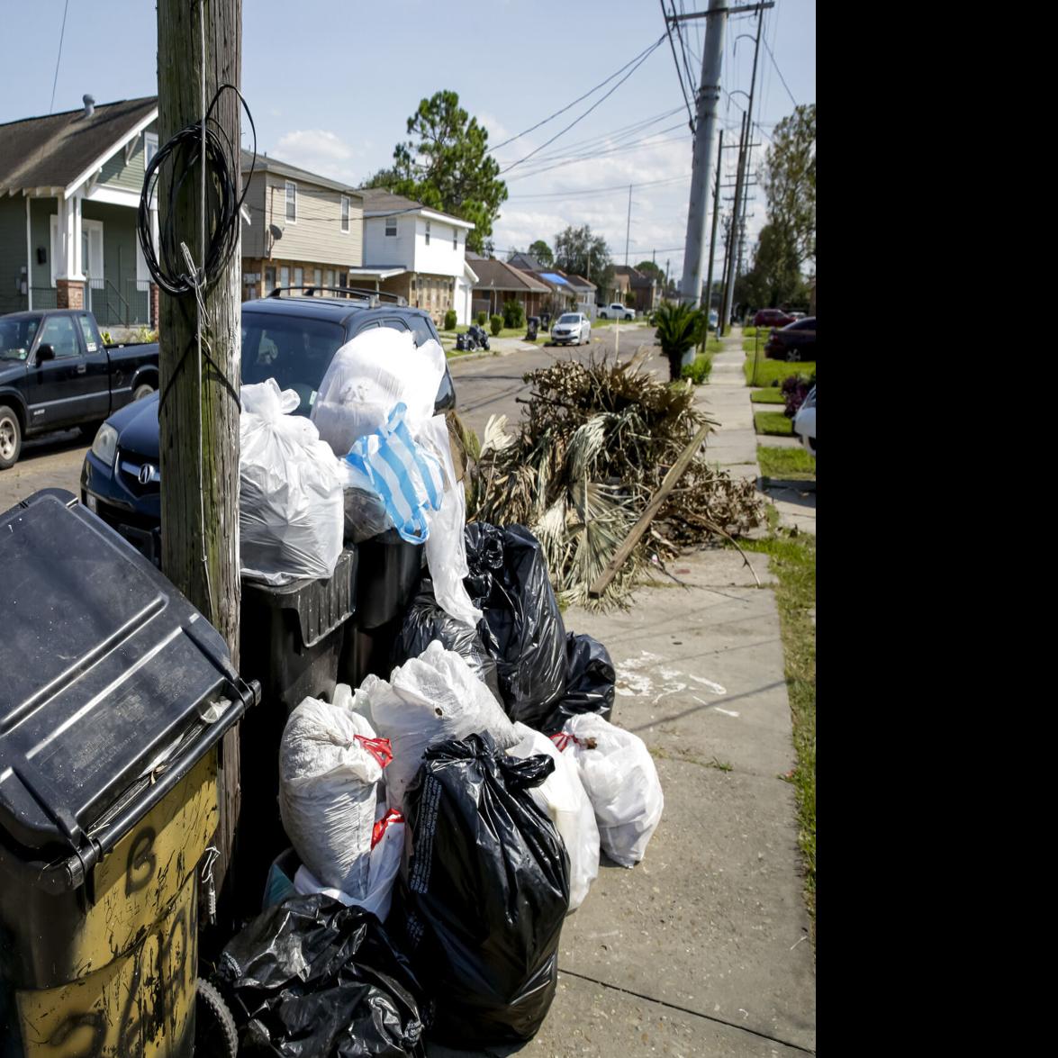 Overloaded dumpster, full garbage container, household garbage b