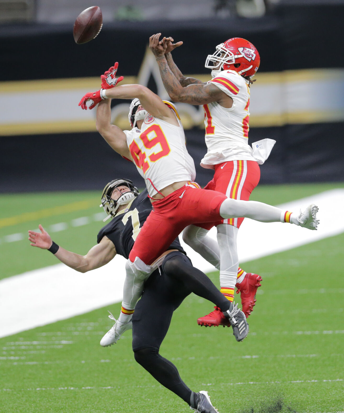 Kansas City Chiefs safety Daniel Sorensen (49) intercepts the ball