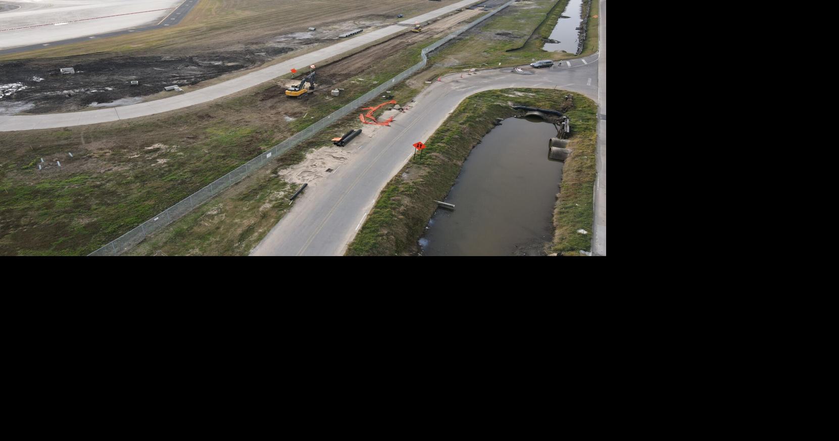 New Orleans airport begins paving new road for faster shuttle trips to new terminal