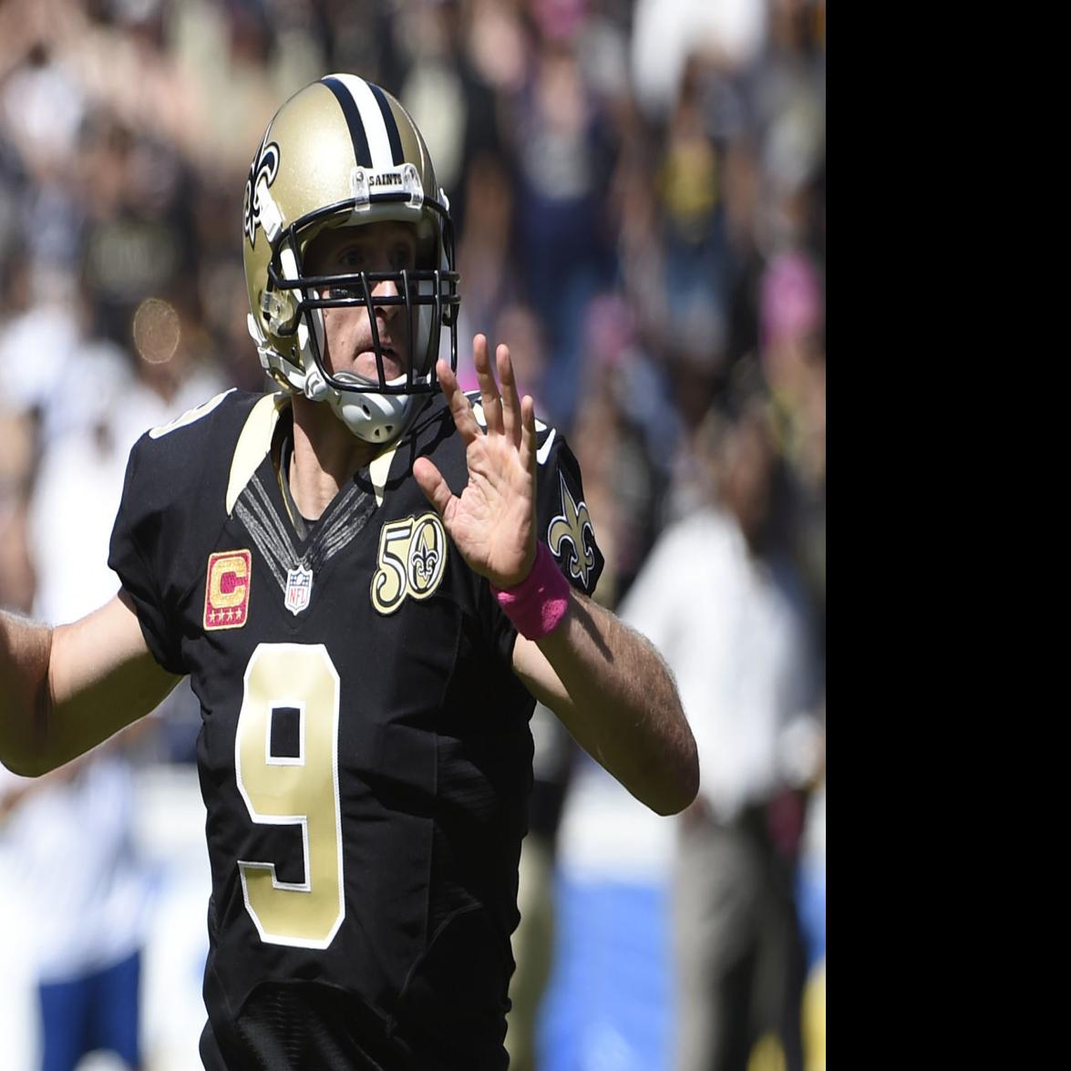 Saints Drew Brees throws the go-ahead touchdown pass to wide receiver  Michael Thomas - Gold Medal Impressions