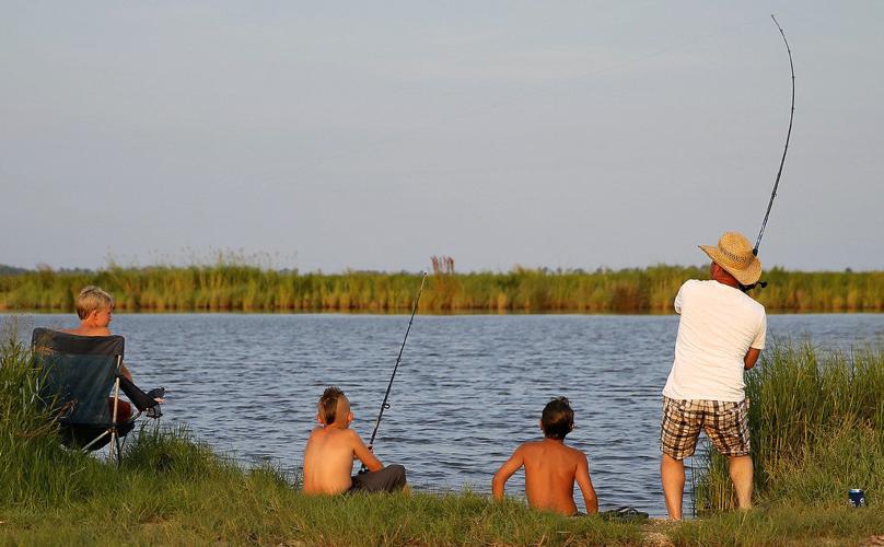 Crabbing, swimming and fishing in a photo gallery One