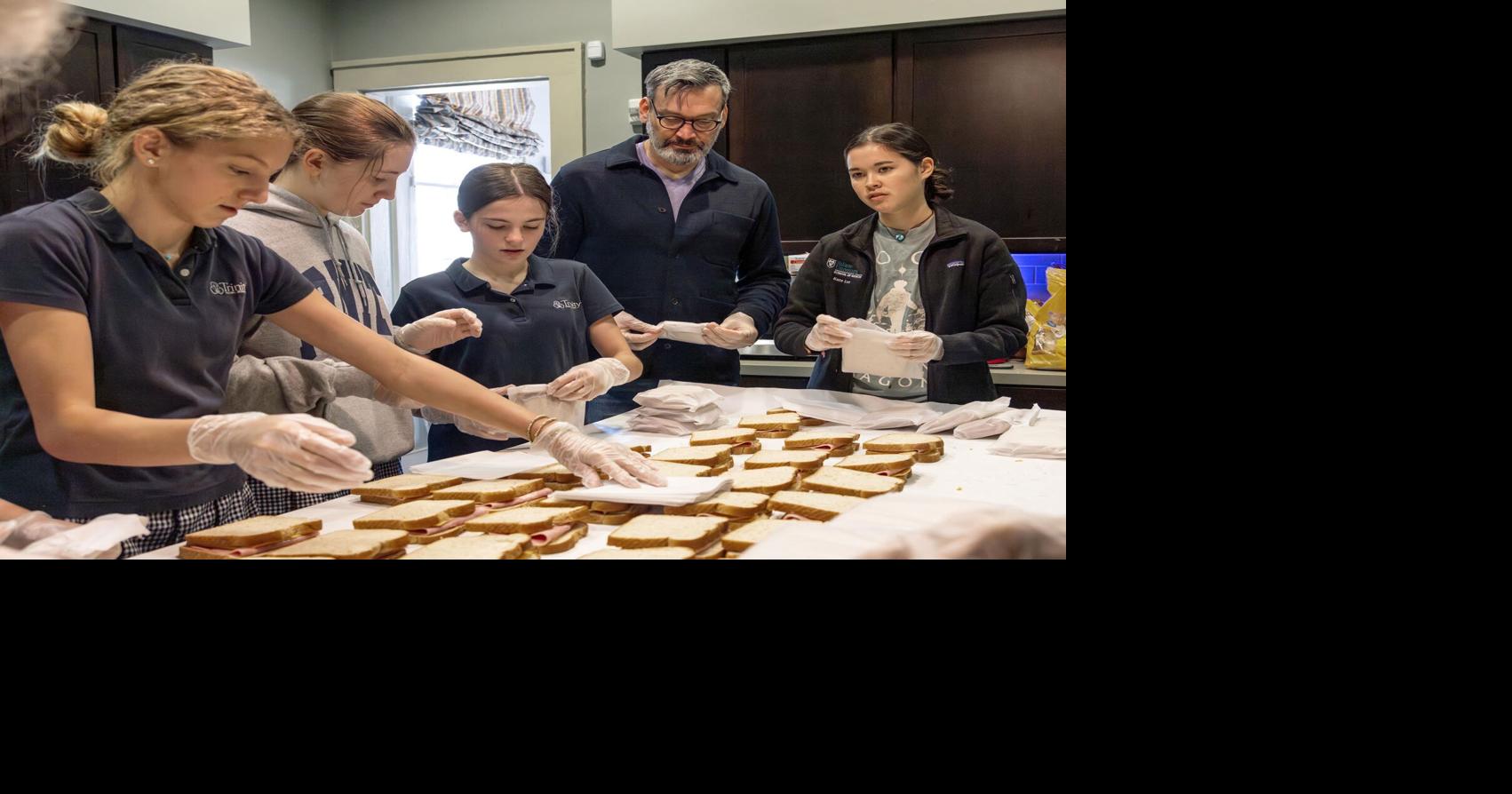 Making sandwiches and spreading love, Loaves and Fishes volunteers feed New Orleans' needy