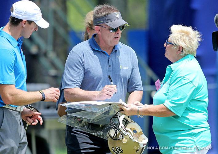 Drew Brees and Sean Payton play in the Zurich Classic ProAm photo