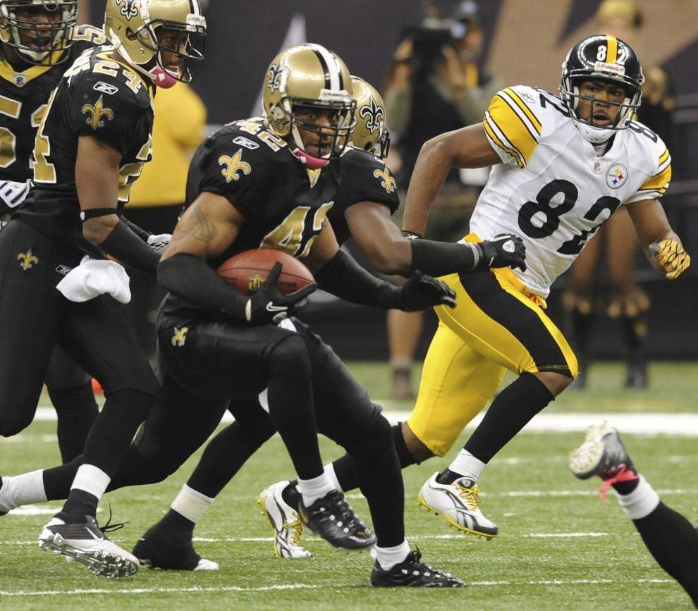 New Orleans Saints safety Darren Sharper (42) celebrates in the second half  of an NFL football game in New Orleans, Sunday, Nov. 8, 2009.The Sainst  defeated the Panthers 30-20. [ (AP Photo/Bill