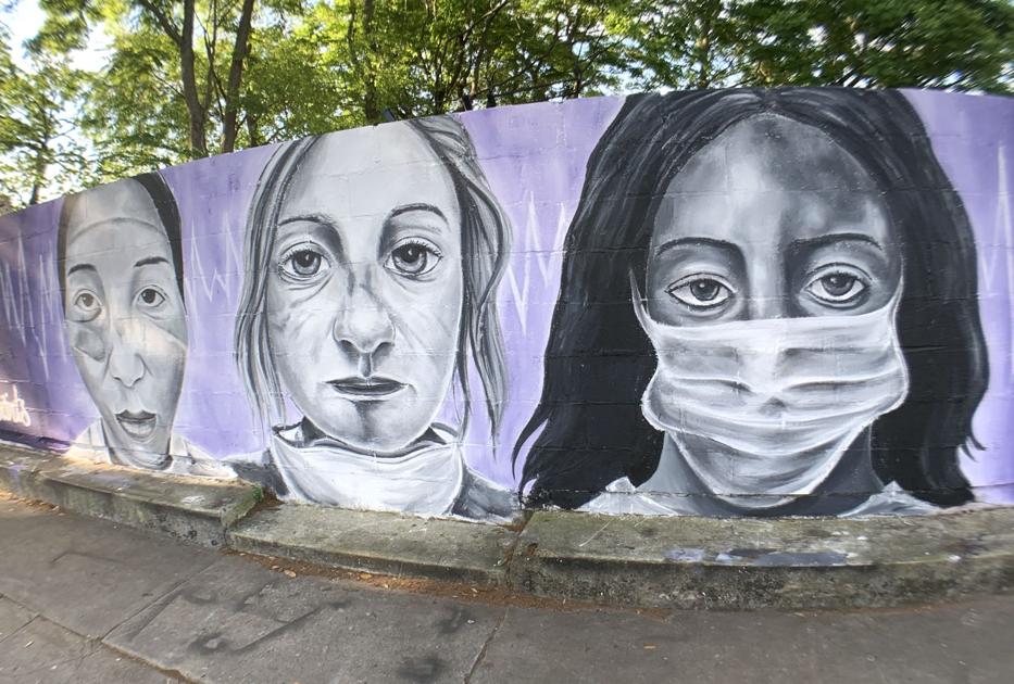 Coronavirus graffiti murals pop up in New Orleans, one serious, one