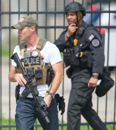 New Orleans Police officer fired at man who pointed weapon at her in ...