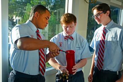 Archbishop Rummel High School candle symbolizes Raider pride | Crescent ...