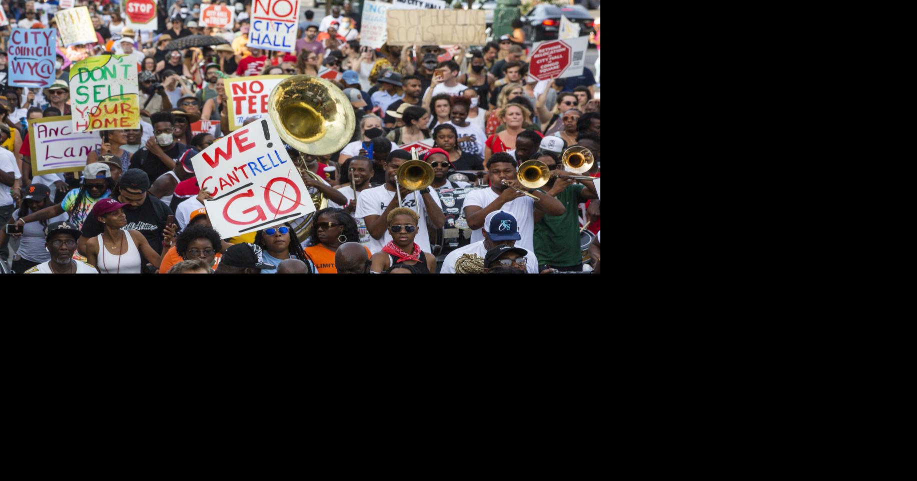 Photos: Protestors march and dance against the proposal to move City ...