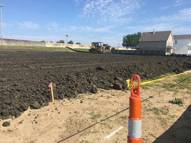 Dump trucks on Bellaire Drive for canal seepage fix to end Saturday