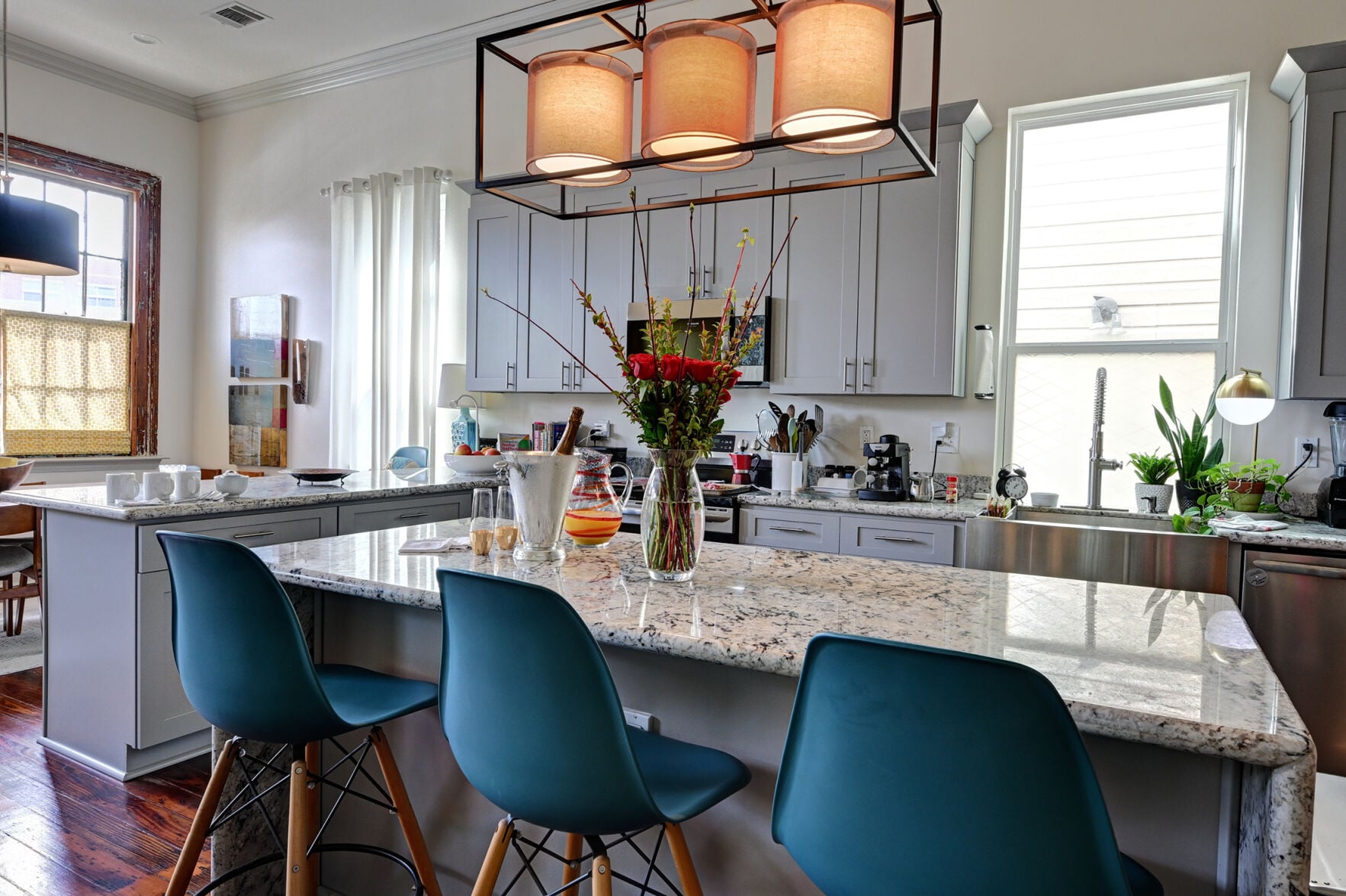 Eclectic artwork and bold color spice up a Central City reno