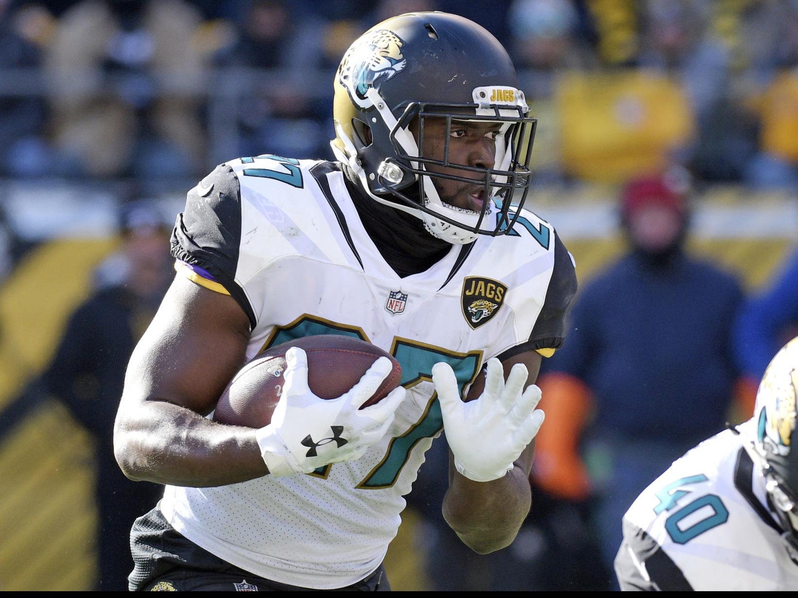 Forever LSU: Leonard Fournette seen wearing LSU shoulder pads during  Jacksonville Jaguars' AFC divisional win, Archive