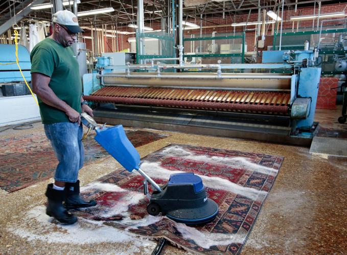 Put through the wringer, flooded rugs come clean Home/Garden