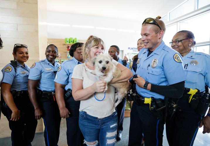Pet project: Police give a boost to animal shelter's adoption event ...