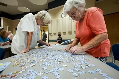 Jigsaw puzzle fans will lay it all on the table at event Jigsaw puzzle fans will lay it all on the table at event