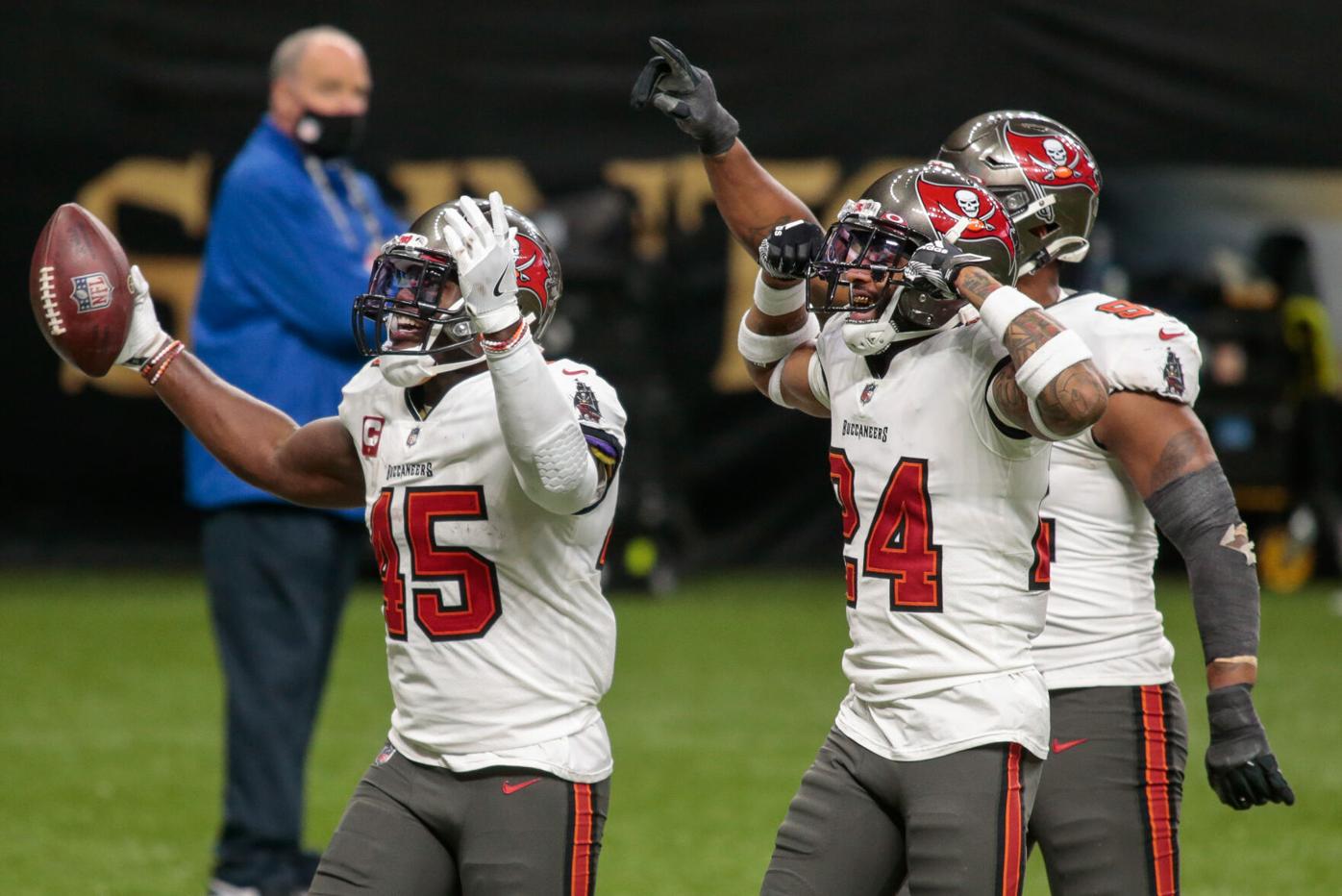 Tampa, Florida, USA. 17th Nov, 2019. Tampa Bay Buccaneers linebacker Devin  White (45) tackles New Orleans Saints wide receiver Michael Thomas (13)  during the NFL game between the New Orleans Saints and