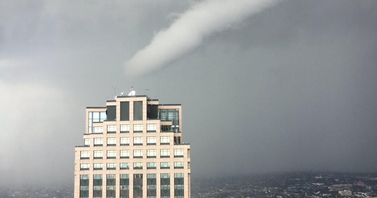 Photos, videos: Severe storm causes funnel cloud, New Orleans home ...