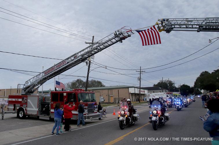Fallen Westwego officer Michael Louviere's funeral service is today