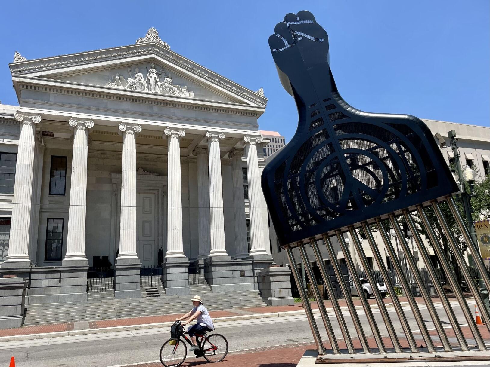 Two-story Black power hair pick, symbol of African identity, erected near  Gallier Hall | Arts 
