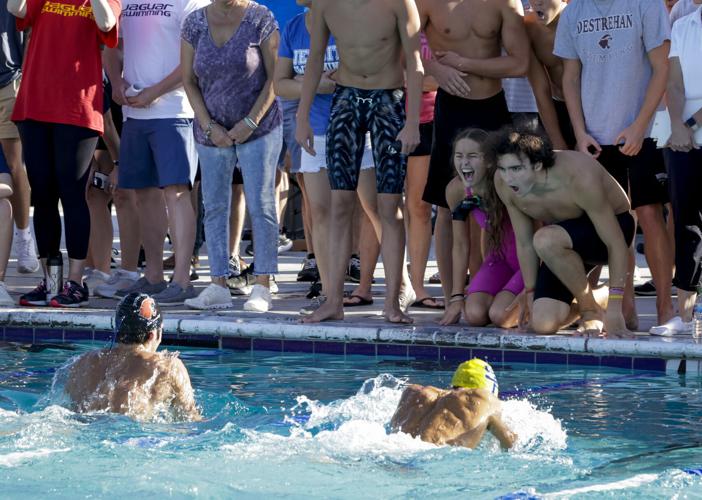 He learned to swim so his grandfather would let him go fishing. Now ...