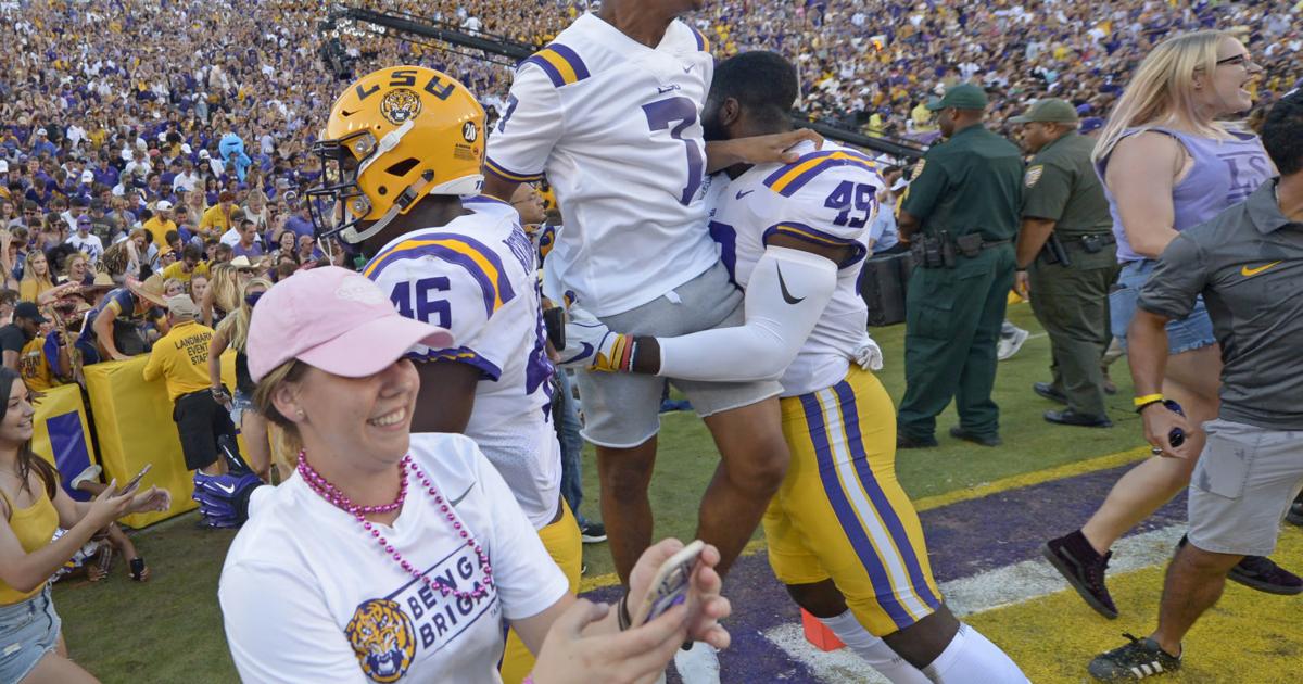 Rushing Field A costly celebration? SEC likely to fine LSU for fans rushing field ...