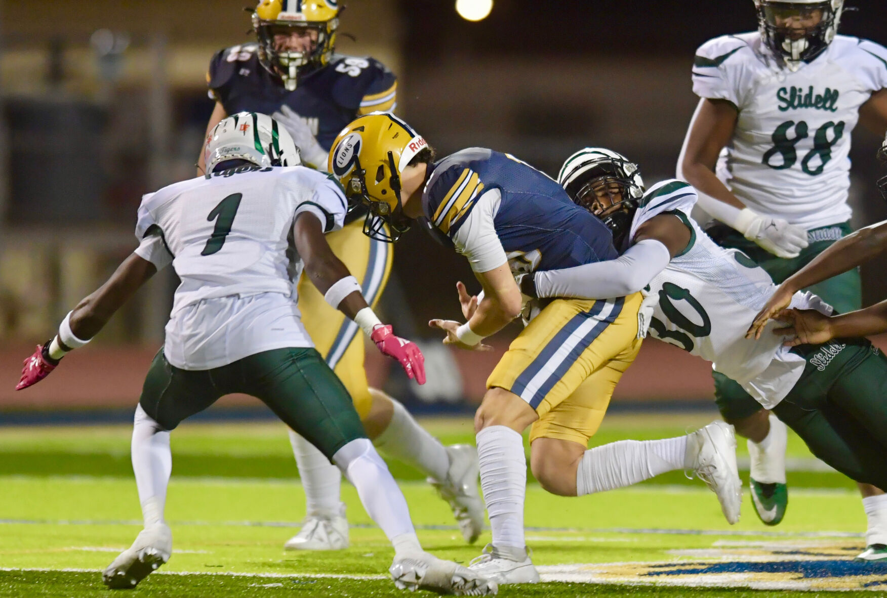 Late defensive scores lift Slidell to a 33-19 victory over Covington in District 6-5A clash