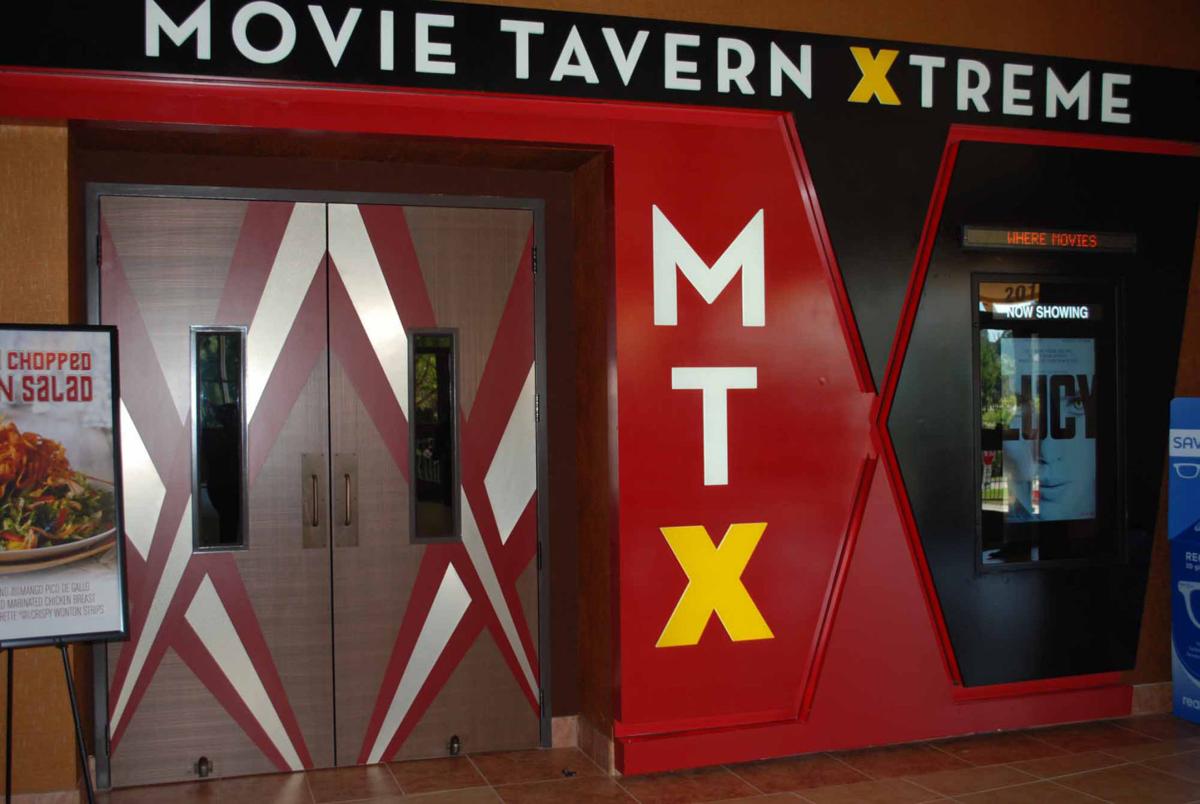 Covington Movie Tavern cuts ribbon, shows off renovated theater ahead